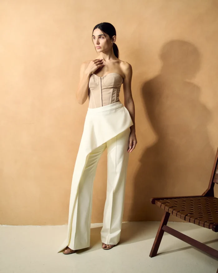 NOUF ABAYA NOV 2ND2319 Structured Nude Corset & Asymmetric Ivory Trousers